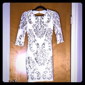 Off white and gold sequin cocktail dress.